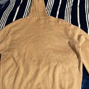 i am selling a new day turtle neck sweater!